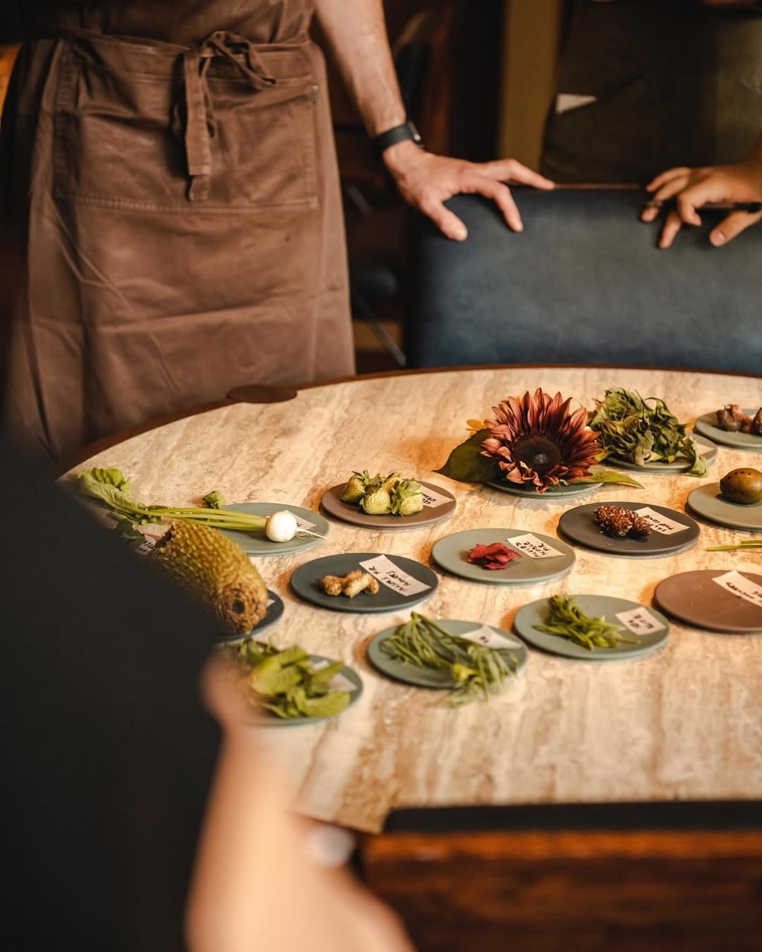 Shared table of seasonal dishes at SOMA